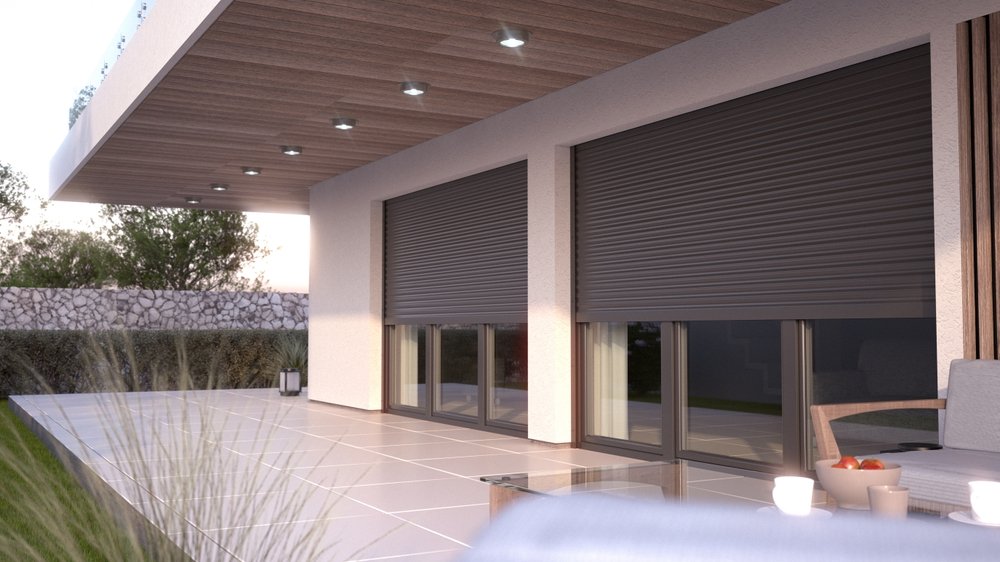 Rolling shutters over sliding patio doors under a timber canopy